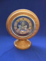 Gold Face in 220mm Dia. Oak surround - £65.